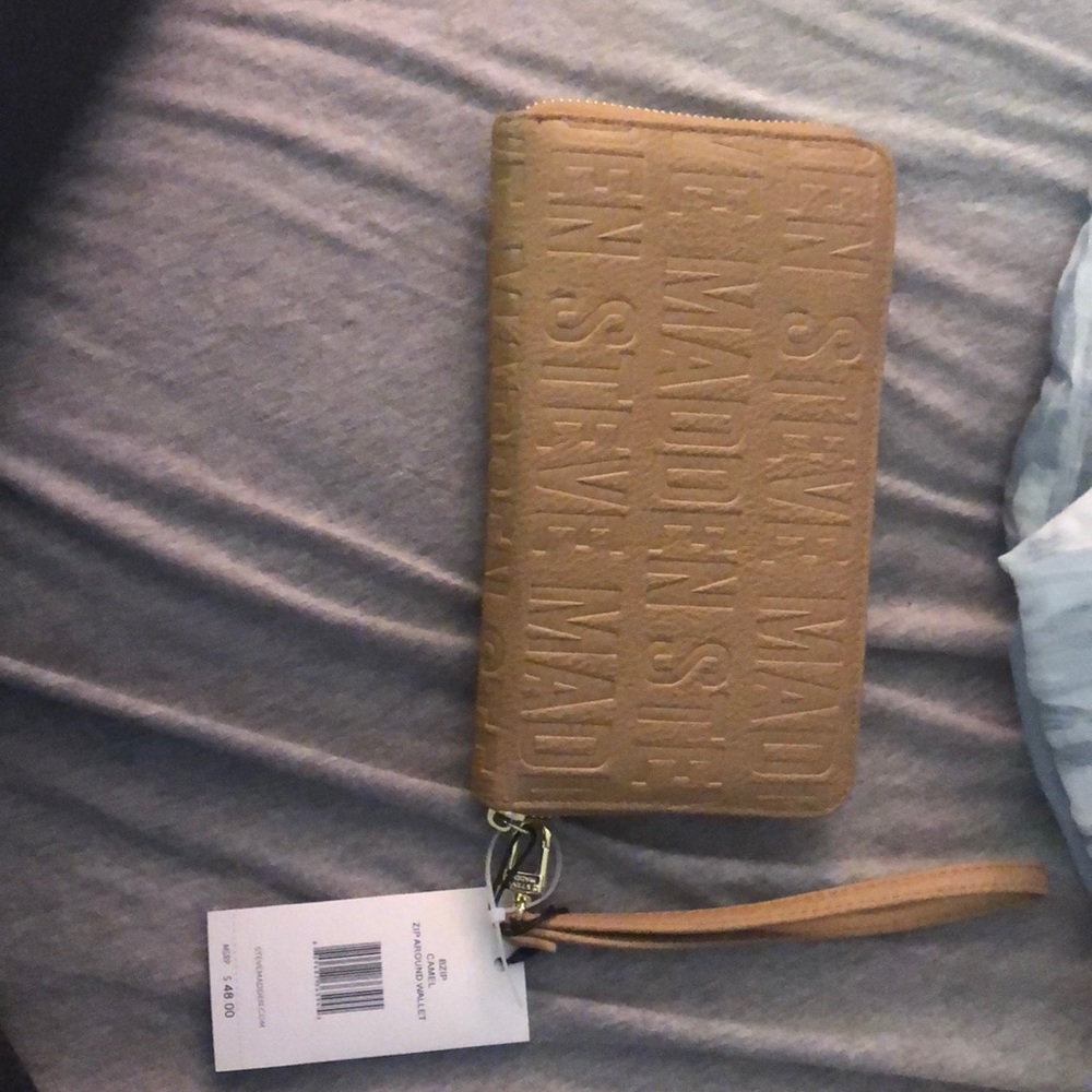 COPY - Steve Madden tan colored wristlet